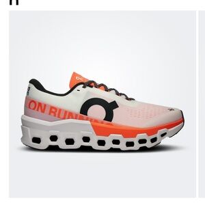 On Running White and Orange Athletic Shoes